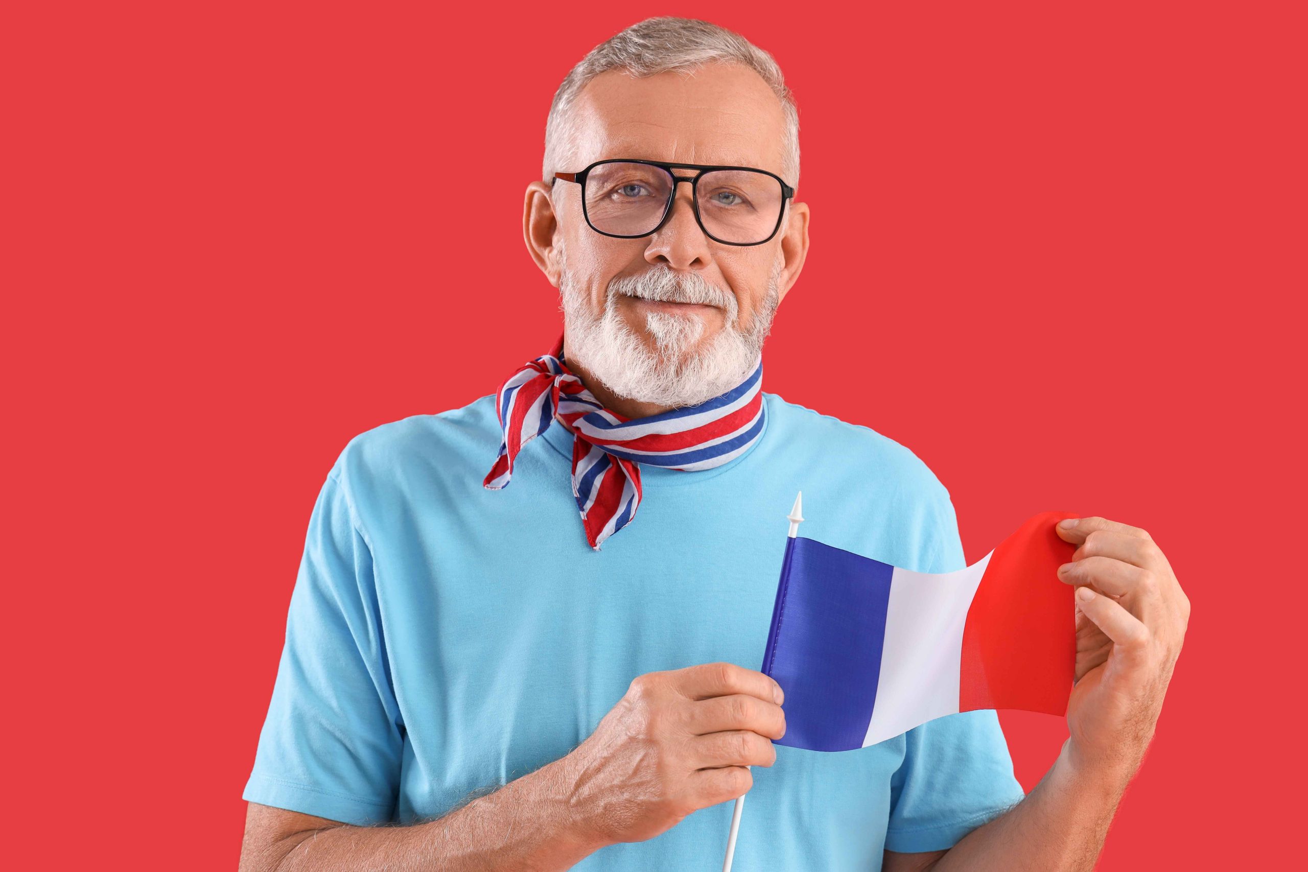 Senior,Man,With,Flag,Of,France,On,Red,Background